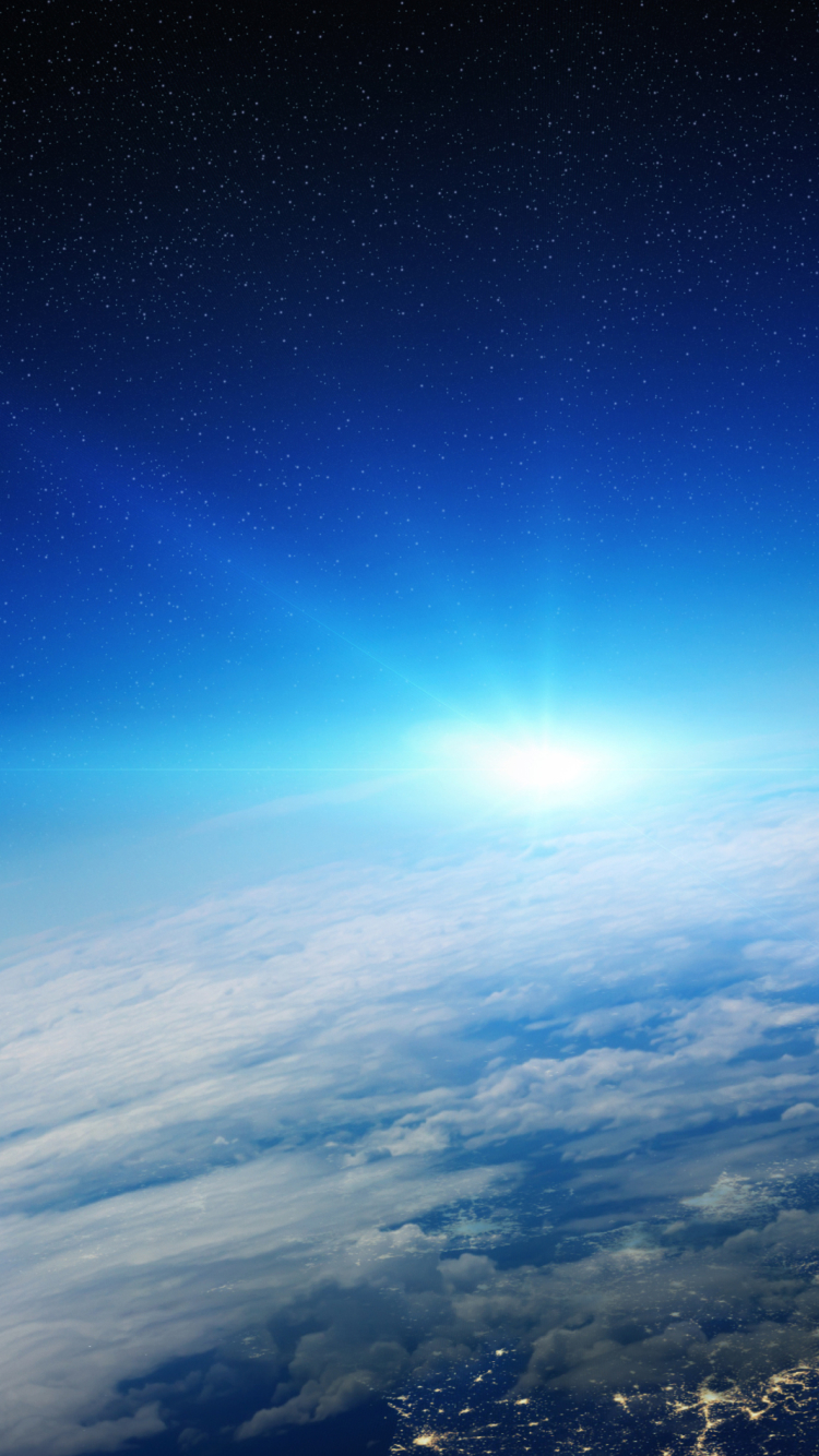 宇宙から見た夜明け